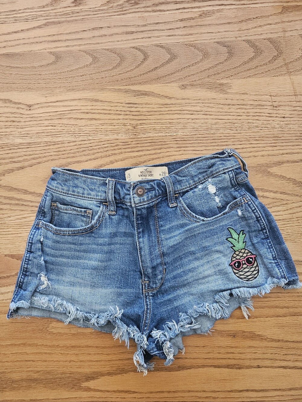 Hollister Vintage High Rise Distressed Denim Cutoff Shorts with Pinapple Size 26